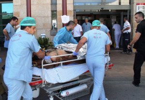 Israeli medics treating an injured Syrian fighter
